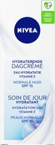 Bol.com NIVEA Essentials Hydraterende Dagcrème - Gezichtscreme - Normale huid - SPF 15 Met vitamine E magnoliaextract en lotusex... aanbieding